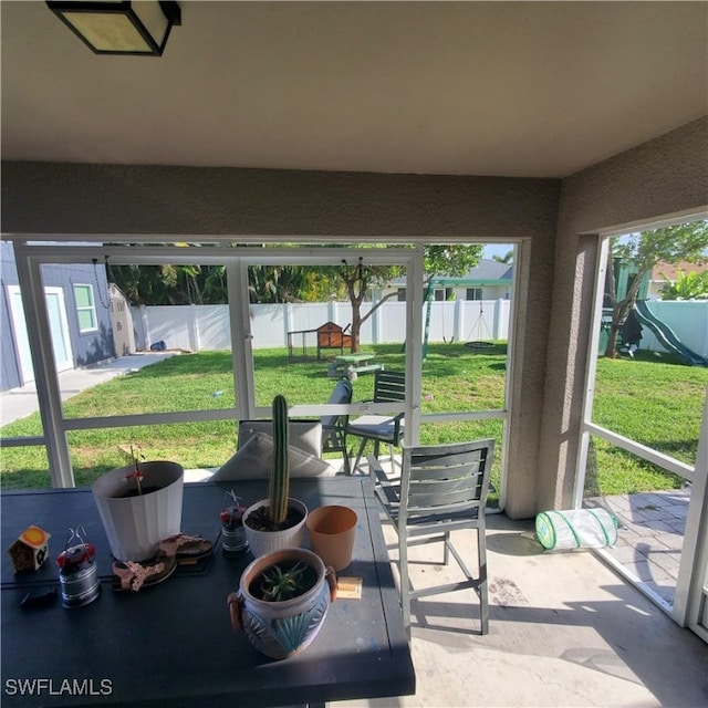 sunroom featuring plenty of natural light