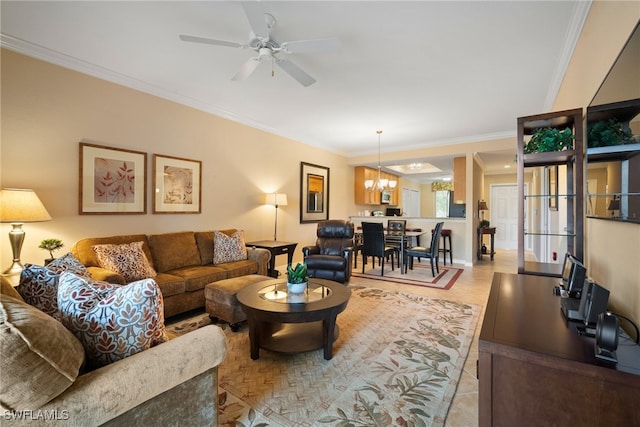 tiled living room featuring ceiling fan with notable chandelier and ornamental molding