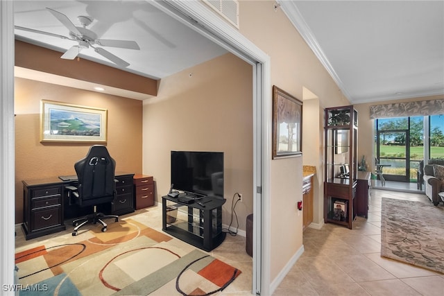 tiled home office featuring crown molding and ceiling fan