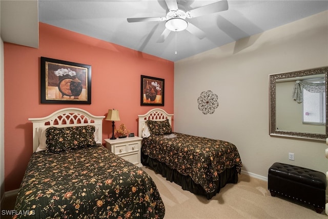 bedroom with light colored carpet and ceiling fan