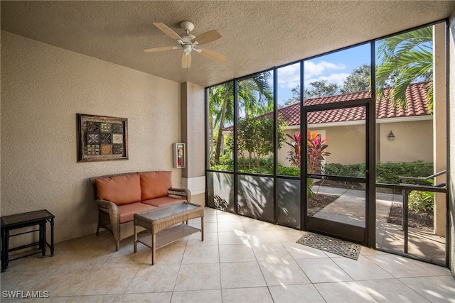 sunroom with ceiling fan