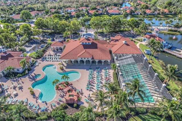 birds eye view of property featuring a water view