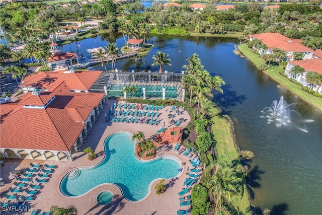 birds eye view of property featuring a water view