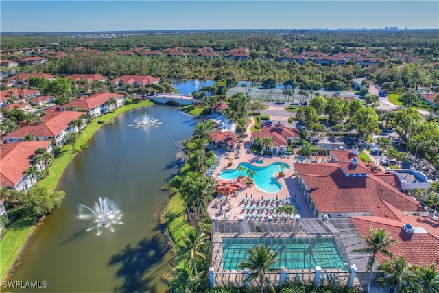 drone / aerial view with a water view