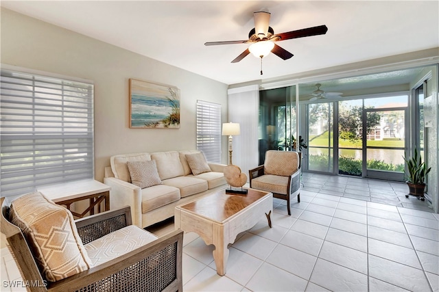 tiled living room with ceiling fan