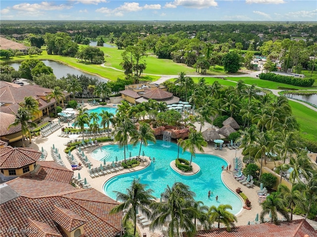 bird's eye view featuring a water view and view of golf course