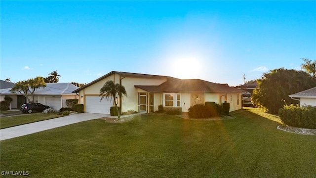 ranch-style house with a front yard and a garage