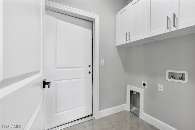 laundry area featuring washer hookup, cabinets, and hookup for an electric dryer