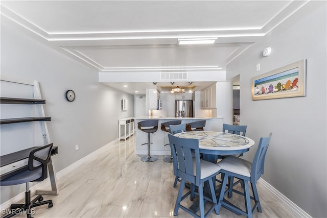 dining room with light wood-type flooring