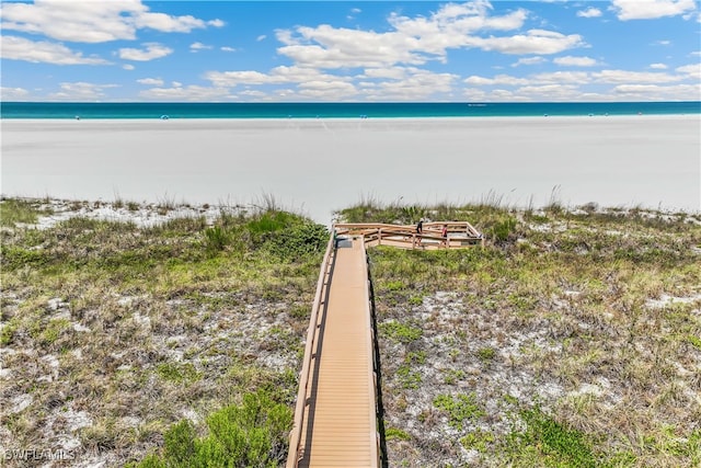 view of water feature with a beach view