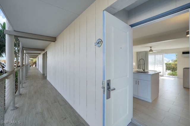 hallway featuring sink