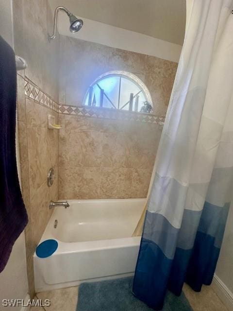 bathroom with shower / tub combo