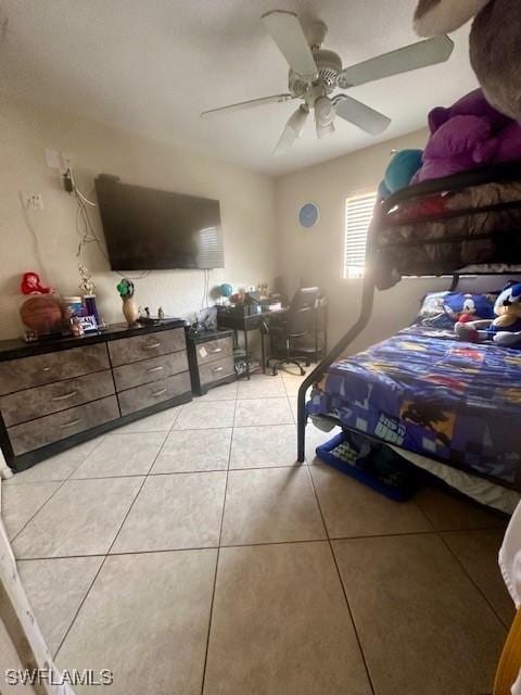 bedroom featuring ceiling fan and light tile patterned floors