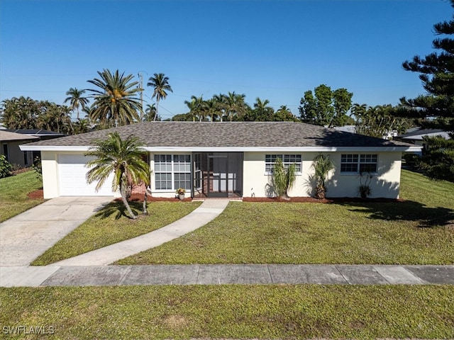 single story home with a garage and a front yard