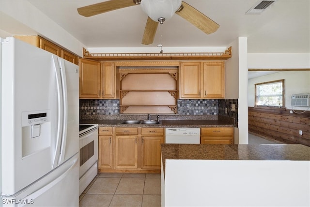 kitchen with light tile patterned flooring, white appliances, backsplash, and sink