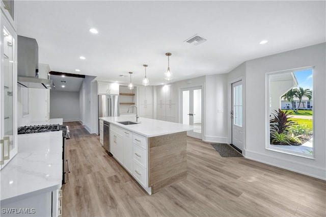 381 Norwood Ct, Fort Myers, FL 33919 - kitchen featuring white cabinetry, stainless steel appliances, a sink, baseboards, and recessed lighting