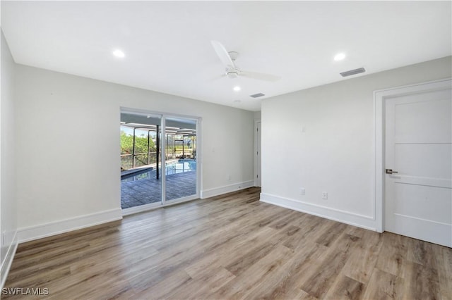 381 Norwood Ct, Fort Myers, FL 33919 - spare room with light wood-style floors, ceiling fan, baseboards, and recessed lighting