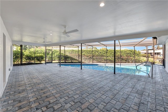 381 Norwood Ct, Fort Myers, FL 33919 - view of swimming pool featuring a ceiling fan, glass enclosure, and a patio