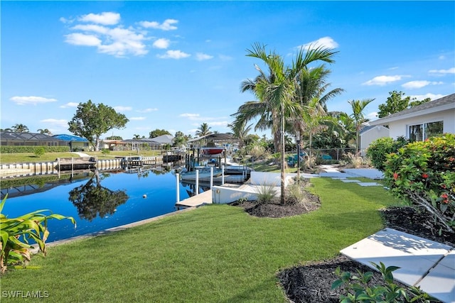 381 Norwood Ct, Fort Myers, FL 33919 - dock with a lawn and a water view