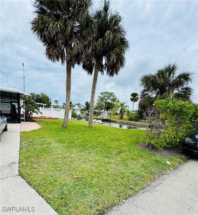 view of yard with a water view