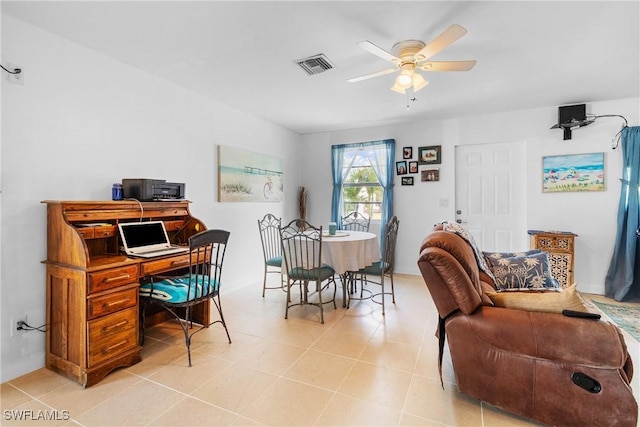 office featuring ceiling fan and light tile patterned flooring