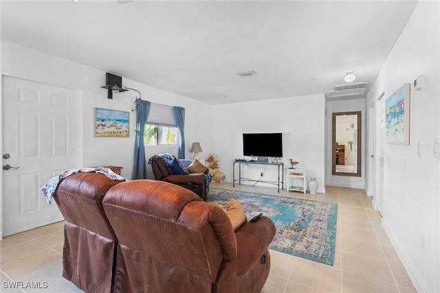 living room with light tile patterned floors