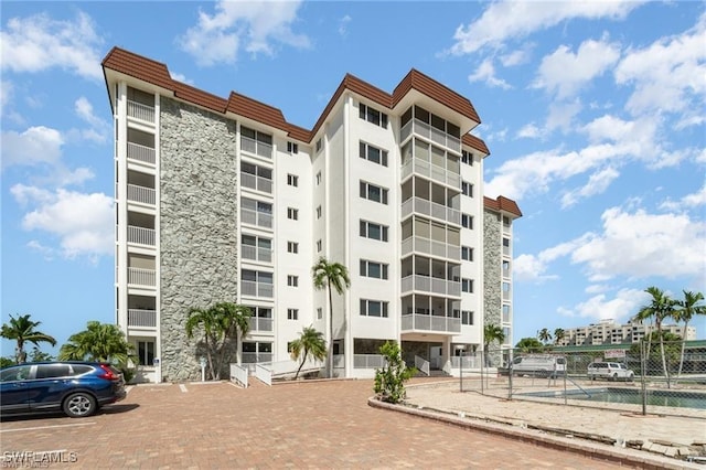 view of property with a community pool