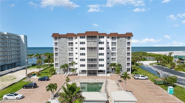 view of building exterior with a water view