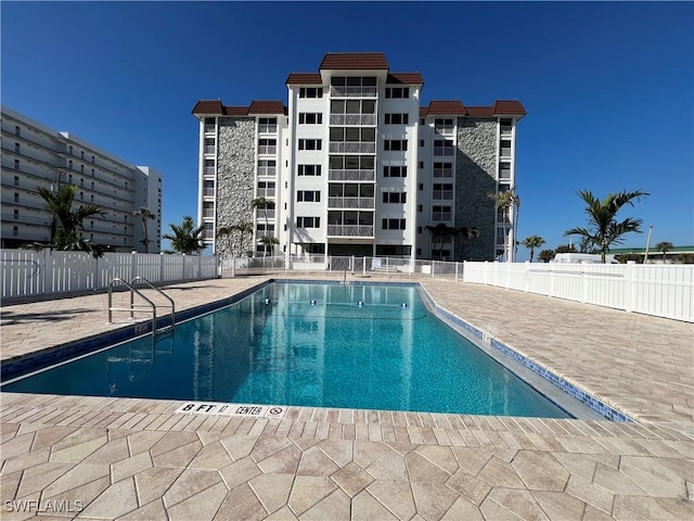 view of swimming pool with a patio area