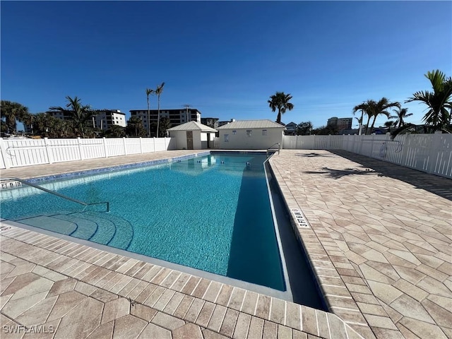 view of pool featuring a patio