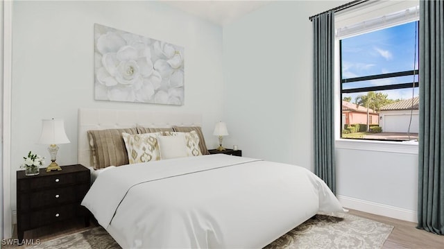 bedroom featuring light wood-type flooring