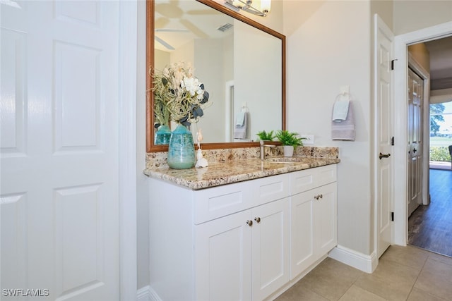 bathroom with vanity and hardwood / wood-style flooring