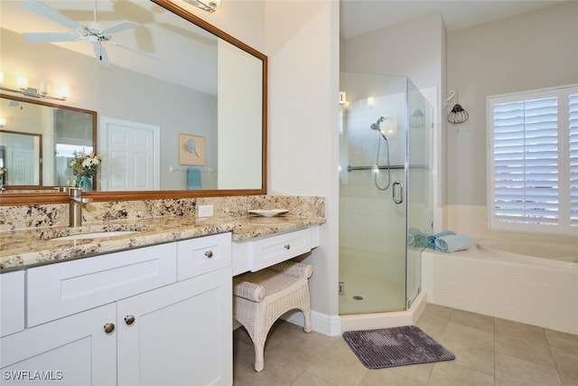 bathroom featuring tile patterned floors, vanity, ceiling fan, and shower with separate bathtub