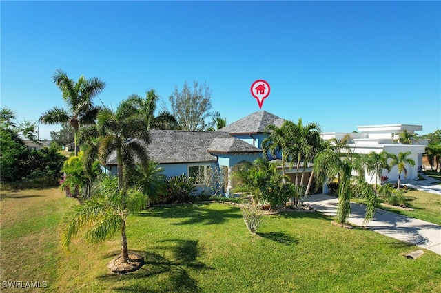 view of front of house with a front yard