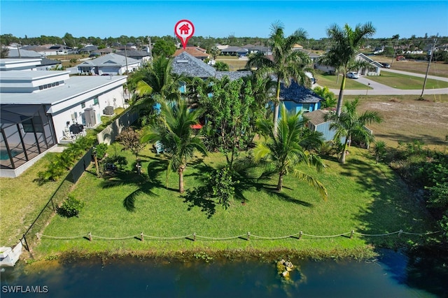 drone / aerial view with a water view