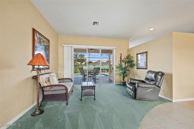 living area with light colored carpet