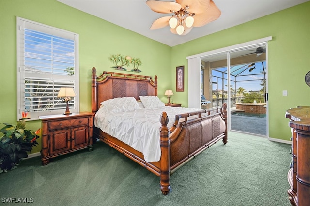 carpeted bedroom with multiple windows, access to outside, and ceiling fan