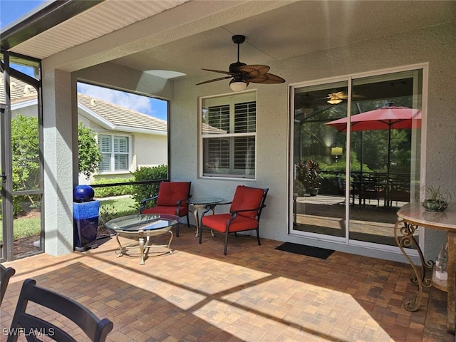 view of patio with ceiling fan