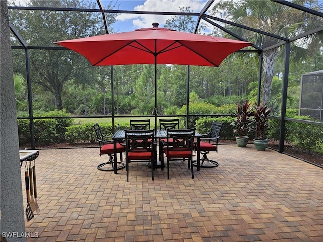 view of patio with a lanai