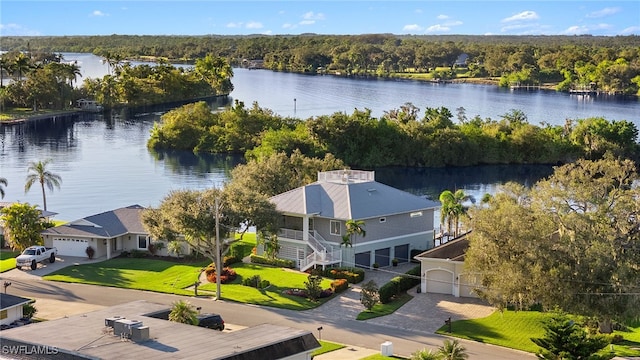 birds eye view of property featuring a water view