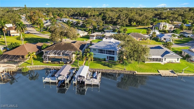 bird's eye view with a water view