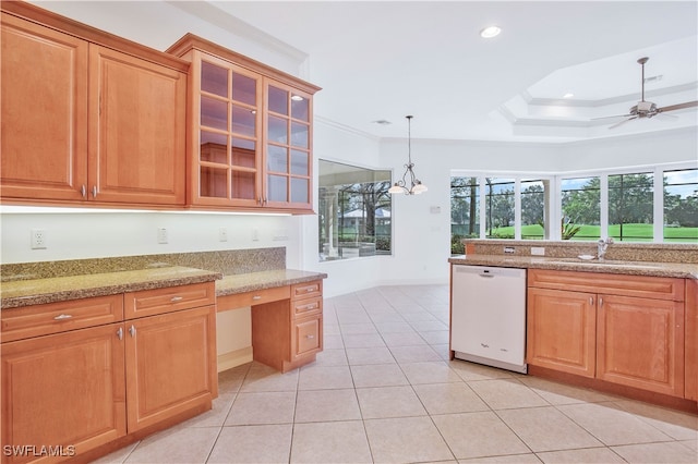 kitchen featuring light stone counters, white dishwasher, ceiling fan, sink, and decorative light fixtures