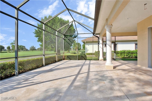 view of patio with a lanai