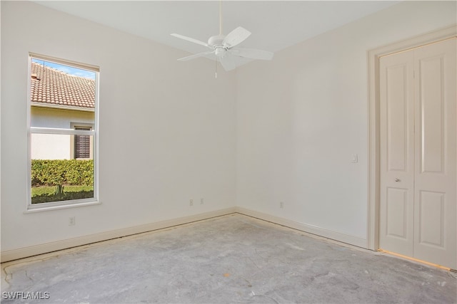 empty room featuring ceiling fan