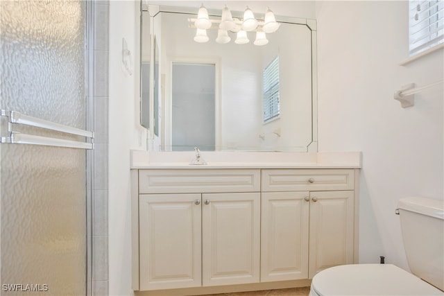 bathroom featuring an enclosed shower, toilet, and a wealth of natural light