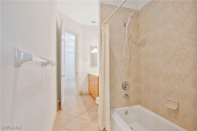 full bathroom with tile patterned floors, vanity, toilet, and shower / bath combo