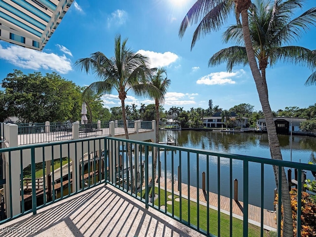 balcony featuring a water view