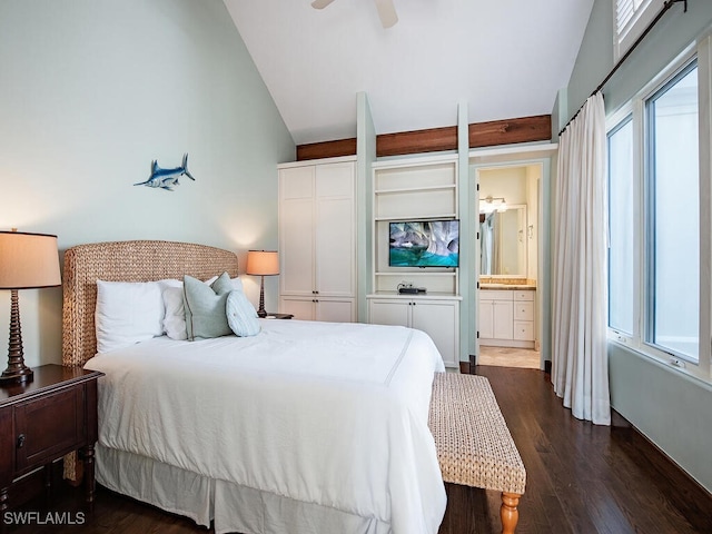 bedroom featuring ensuite bathroom, vaulted ceiling, ceiling fan, and dark wood-type flooring