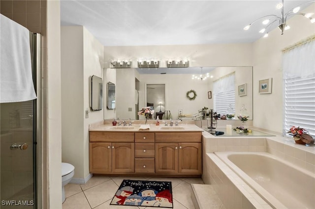 full bathroom with vanity, tile patterned floors, toilet, independent shower and bath, and a notable chandelier