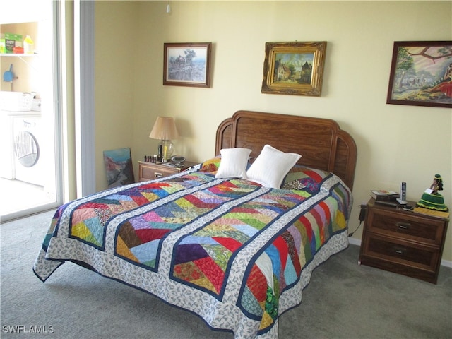 bedroom featuring carpet flooring and washer / clothes dryer